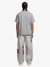 Jeans Vintage Washed con Stampa Collage — Vista 5