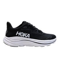 Hoka Clifton 10 nera, vista laterale con spessa intersuola bianca