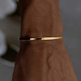 Bracciale aperto da uomo in acciaio inox minimalista