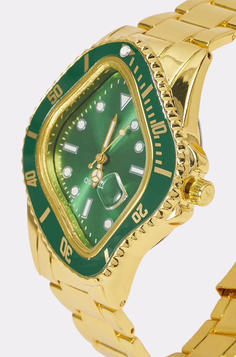 Orologio Dorato con Quadrante Verde