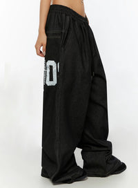 Jeans Baggy con Grafica sul Retro