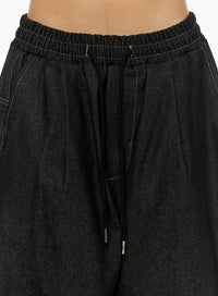Jeans Baggy con Grafica sul Retro